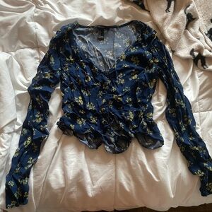 blue and yellow floral blouse